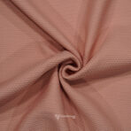 Self Textured Popcorn Plain Peach Shirt Fabric (Width 58 Inch)